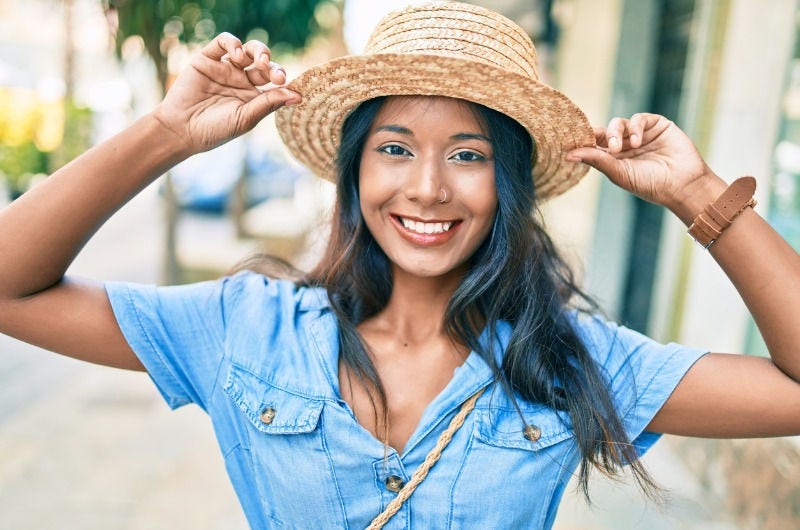 Smiling woman wearing a hat